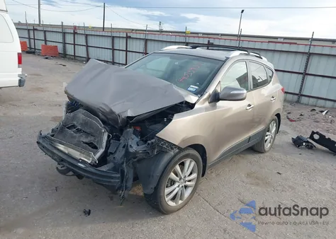 2012 Hyundai Tucson Limited z USA, uszkodzony, nr VIN KM8JU3AC1CU530974